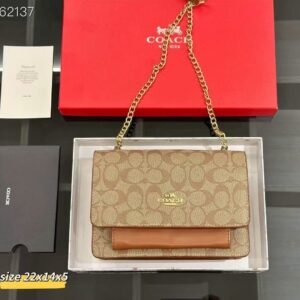 Bolso de mano Coach con tejido de cuero